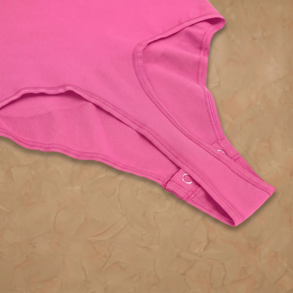 Vellure Paris Signature L'Amour — Sophisticated long-sleeve sculpting bodysuit featuring an elegant diamond neckline and a seamless thong silhouette for all-day comfort.