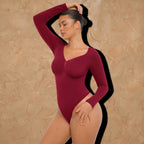 Vellure Paris Signature L'Amour — Sophisticated long-sleeve sculpting bodysuit featuring an elegant diamond neckline and a seamless thong silhouette for all-day comfort.
