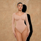 Vellure Paris Signature L'Amour — Sophisticated long-sleeve sculpting bodysuit featuring an elegant diamond neckline and a seamless thong silhouette for all-day comfort.