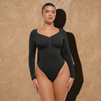 Vellure Paris Signature L'Amour — Sophisticated long-sleeve sculpting bodysuit featuring an elegant diamond neckline and a seamless thong silhouette for all-day comfort.