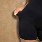 Vellure Paris Signature Pureté — Lightweight seamless sculpting bodysuit with a minimalist round neckline and an elegant open-back design for a second-skin fit.