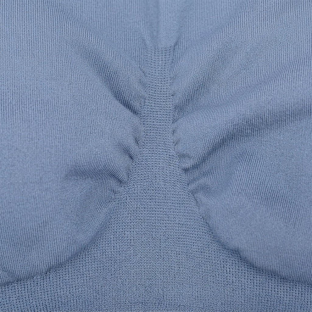 Vellure Paris Signature Pureté — Lightweight seamless sculpting bodysuit with a minimalist round neckline and an elegant open-back design for a second-skin fit.