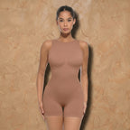 Vellure Paris Signature Pureté — Lightweight seamless sculpting bodysuit with a minimalist round neckline and an elegant open-back design for a second-skin fit.