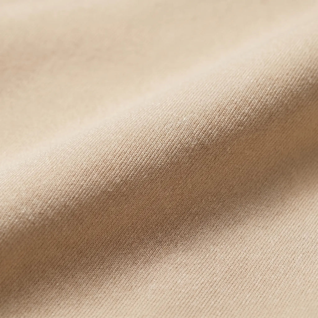 Vellure Paris Signature L'Invisible in Nue Divine — Macro shot of the buttery-soft material texture and breathable weave.