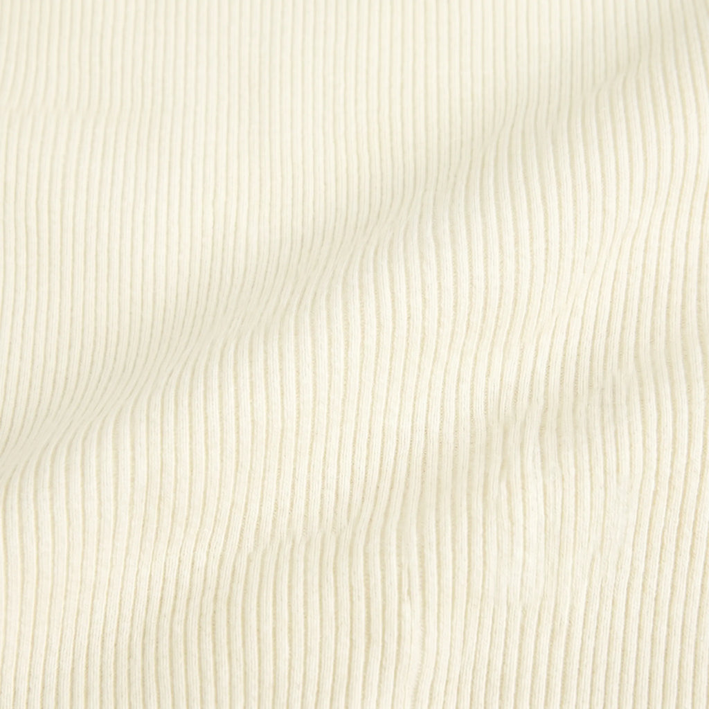 Vellure Paris L’Exécutif Bureau — Sophisticated sculpting shirt-dress featuring long sleeves, a faux placket with buttons, and a ribbed texture for a polished silhouette.